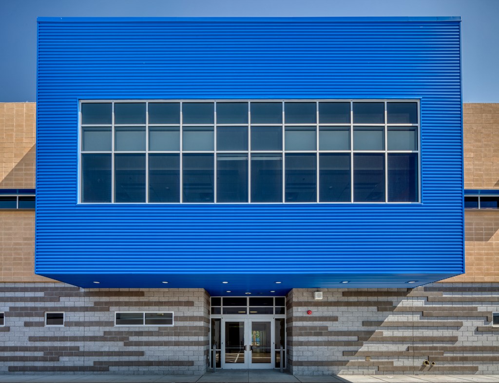 The Doris Reed Elementary School in Las Vegas features metal wall panels in their signature “Roadrunner Blue.”