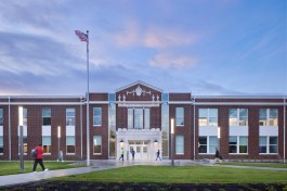 The replacement school retains the look of the original building. Terra cotta was salvaged from the original school and used for the new entry.