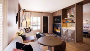 A rendering of the living room in the one-bedroom villa at the Privado Villas