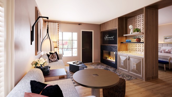 A rendering of the living room in the one-bedroom villa at the Privado Villas 