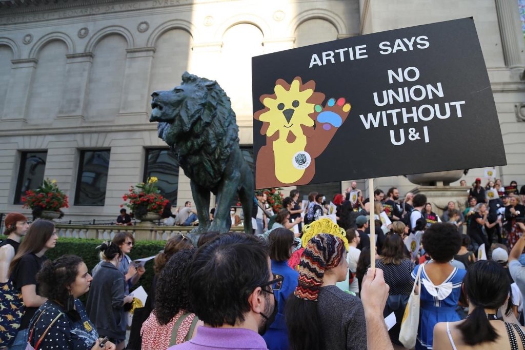 Members of Art Institute of Chicago Workers United and other supporters demonstrate outside the School of the Art Institute of Chicago.