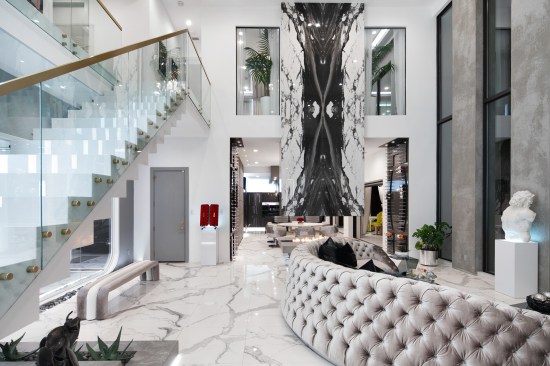 Bookmatched marble over the fireplace.