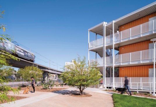 Constructed in just six months, the Hilda L. Solis Care First Village in Los Angeles features three kinds of modular elements: shipping crates, conventional prefabricated units, and single-story trailers. 