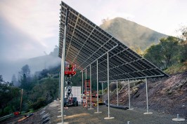 After a major fire destroyed the power lines that served Briceburg, California, the utility PG&E worked with BoxPower to install a remote grid with a 36.5-kilowatt solar array, a 69-kilowatt-hour battery bank, and two 35-kilovolt-amp propane prime power generators.