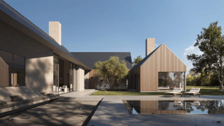 A courtyard centered within the home’s footprint promotes the outdoor grange lifestyle. An uninterrupted boardform concrete wall seemingly pours into the pavement to provide a built-in lounge. Overhead, roofing extends to shade the patio from the California sun. Etched into the concrete patio, a bocce ball court offers another palliative pastime. The knife-edge pool, a beloved staple within Bittoni Architects’ portfolio, mimics a lake with its turquoise hue.
