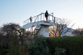 A roof deck offers an escape upwards on the flag-shaped site