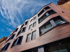 Floating above a glass storefront, Willkommen on Vine’s striking brick geometry has quickly become a neighborhood favorite.