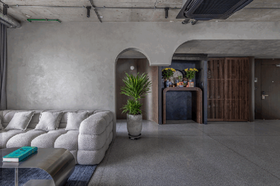 terrazzo floors and walnut furniture create a tranquil and warm atmosphere