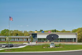 Created a new main prominent entry with increased daylighting and security. Views from the interior look out to the solar flower connecting students with the school’s energy efficient mission.