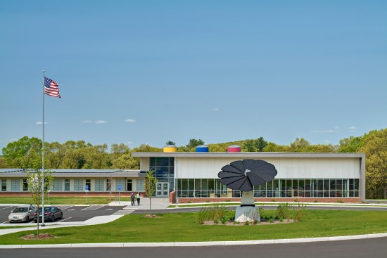 Created a new main prominent entry with increased daylighting and security. Views from the interior look out to the solar flower connecting students with the school’s energy efficient mission.