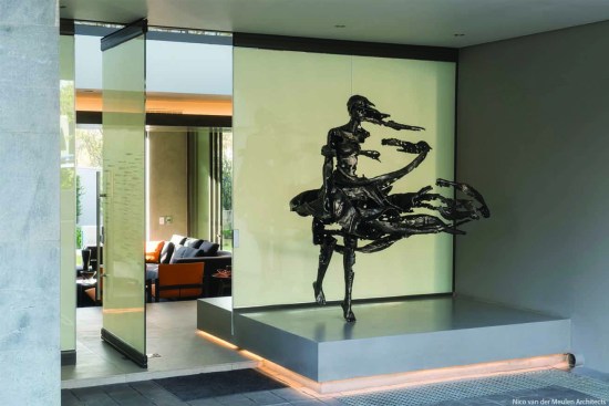 Smart film has been applied to the windows at the entrance to the home, as well as a sculpture by Regardt van der Meulen