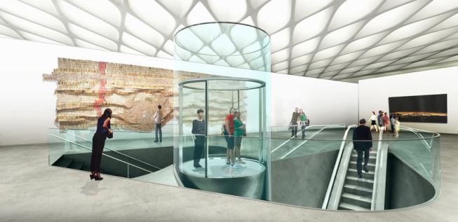 Third-floor gallery entrance with escalator, circular glass elevator and stairwell.