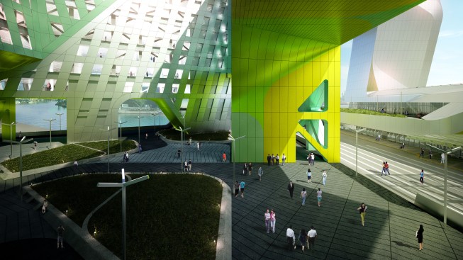 Programmatic volumes surround a central courtyard.