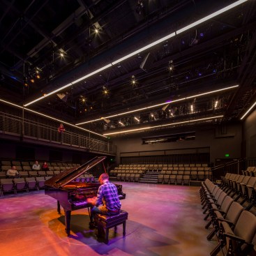 The first goal of this blackbox theater space is to provide a flexible and adaptable teaching tool, which can be shared by the various disciplines.  The overhead catwalk system provides flexibility in lighting systems, which can be installed and modified by the students. 