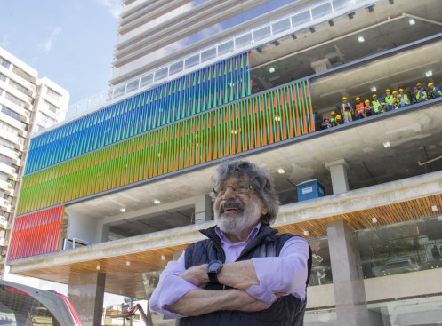 Western facade view from below with Carlos Cruz Diez, the artist