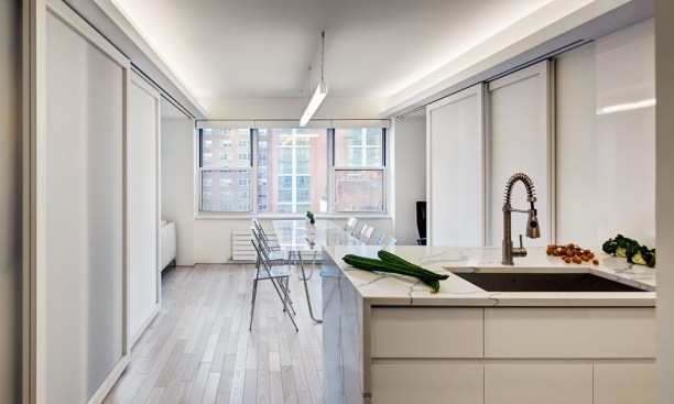 Open Loft Kitchen/Dining  with Sliding Panels in a Semi Open/Closed Position