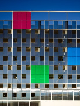 A view from the Child Care Center playground illustrates the playful color block connection