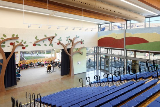 Multipurpose room connects to music room.