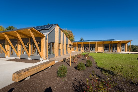 In addition to the aesthetic benefit of the all-wood structure, the wood absorbs latent humidity and mediates diurnal temperature swings contributing to improved thermal comfort from material selection.