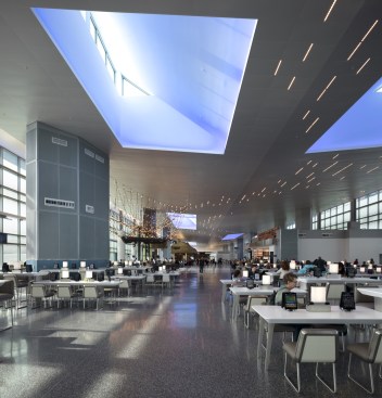 Holdroom spaces are combined into spacious multi-function environments to provide passengers with a variety of retail, restaurant, entertainment, and relaxation touchpoints.