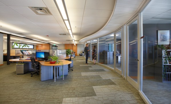  Open production areas encourage department interactivity with work pods designed by Herman Miller.