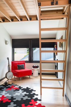 Child’s bedroom with ladder to loft space