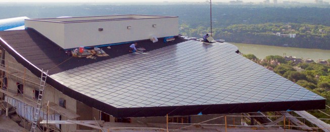 Installing the 2500 panel roof.