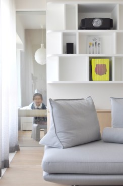 A series of glass interstices allow for playful peeking into the living spaces.
