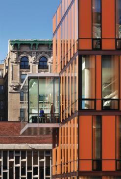 On the building's southwest corner, a projecting volume houses a studio space for senior architecture students. Clad in clear vision glass, the room stands out from the rest of the copper-toned fa?ade. Before getting to work in the building, the students had a chance to influence its design. "The color of the building is something we spent a huge amount of time on. We must have gone through hundreds of options," vice president for administration Lisa Gamsu says. "We took full-scale mock-ups and hung them on the lawn and students voted. It was a fun process."