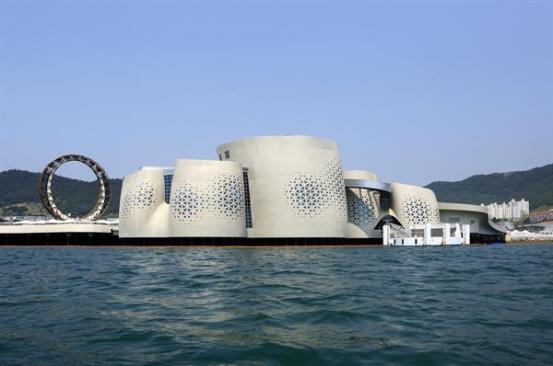 The west, sea-facing elevation of the pavilion consists primarily of concrete.