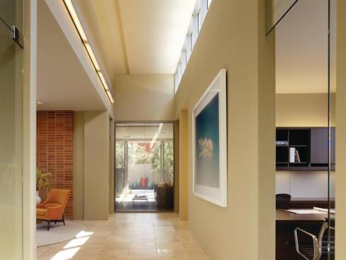 The north wing houses back-of-house functions while the south wing, here, has more public spaces such as the reception area.