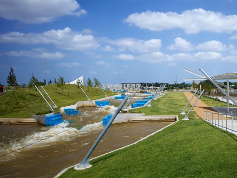A view of the recreational channel looking east with the Kayak Building on the horizon and the pavilion on the right. 