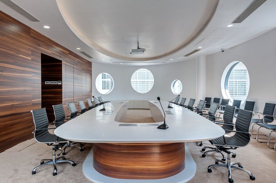 A  spacious conference room of ----- capacity  is designed in such a way that  the oval form is enhanced through the false ceiling & its furniture. In all the areas, interior décor shows innovation, originality & seamlessly integrated with the architectural style. 
