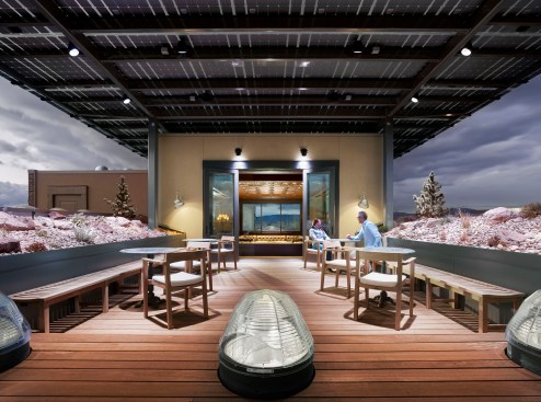 Stair to mezzanine, with  pressed tin ceilings.