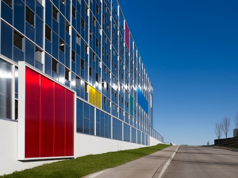 The south elevation looking east provides street level view of the color blocks across the street from the Child Care Center.
