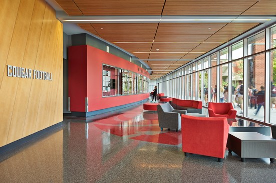 Students use the elevated west walkway daily and in doing so, experience the Hall of
Fame through large expanses of glass.
