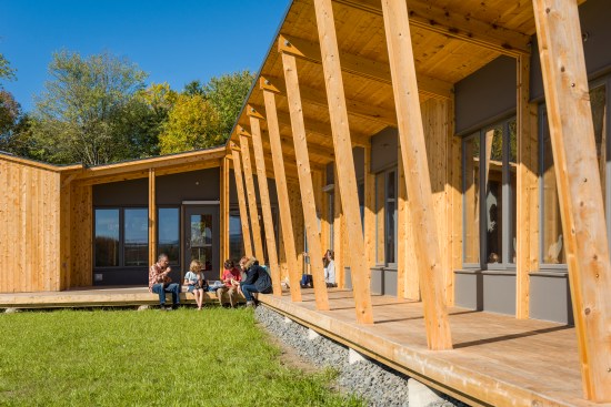 The educational team at the Hitchcock Center wanted two school groups to be able to play outside at the same time. On either side of a Z-shaped building, there are two courtyards, called The Den and The Nest.