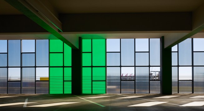 Polycarbonate punctuation combines color with voids and linear texture.  