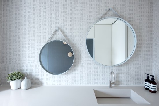 The bathroom celebrates natural materials and kids’ friendly accessories.
