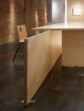 The+Baltic+Birch+panels+interlock+effortlessly+as+vertical+and+horizontal+planes+become+a+table.++Custom+shims+celebrate+the+uneven+historic+floor.++