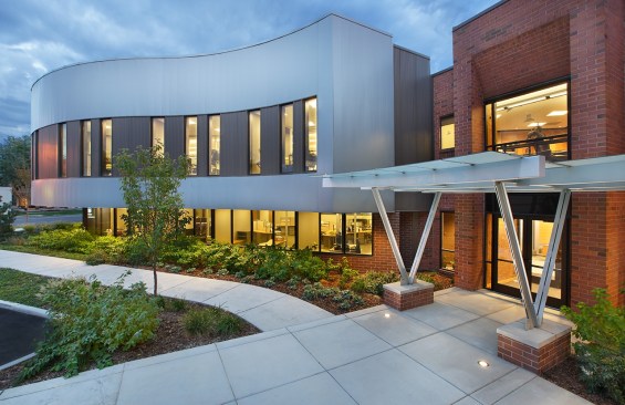 Ample low-lead glass brightens the interior and exposes staff on task as the heartbeat of the firm.