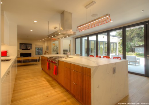 After- View from Kitchen to Living and Family Rooms (doors closed)