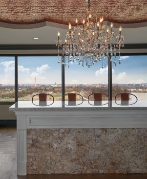 The front sitting area highlights stunning eighth-floor panoramic views of Arlington, VA and Washington, DC. The recessed ceiling, additional copper touches, and chandelier add to Trustify’s atypical office style. Beer, wine, and Vivreau still and sparkling water are on tap.