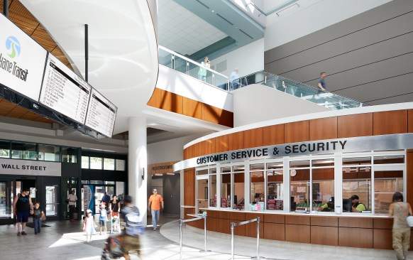 The Customer Service Center and restrooms were relocated to the street level to improve rider convenience and to help create a sense of place adjacent to the retail and new interior waiting areas.