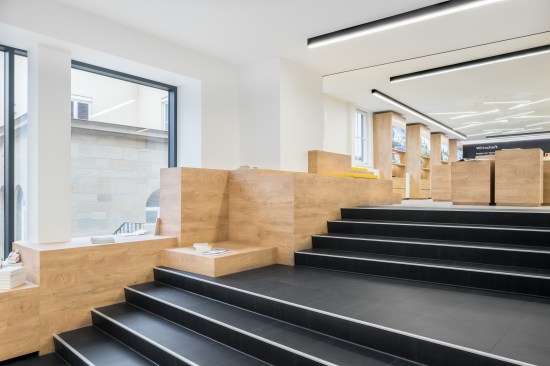 the seating area accompanies visitors to the upper floor