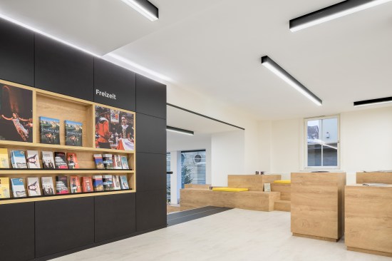 corporate wall as a connective design element with additional uses