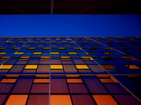 The west elevation at dusk combines all the colors into a mosaic