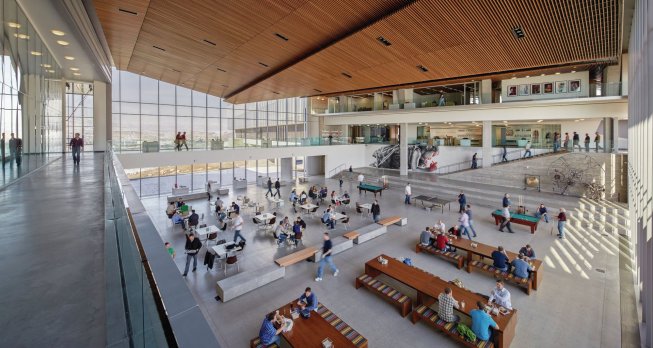 Ping-pong tables give an open cafeteria a youthful edge; communal tables promote group interaction well after lunch hour.