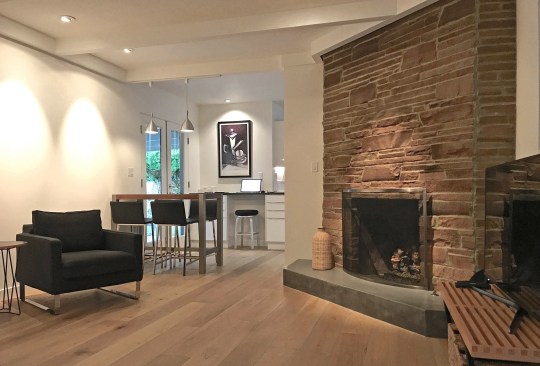 family room with concrete hearth