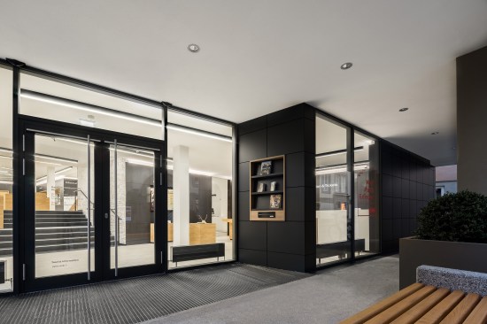 the harmony between anthracite, white and wood tones is noticeable from outside